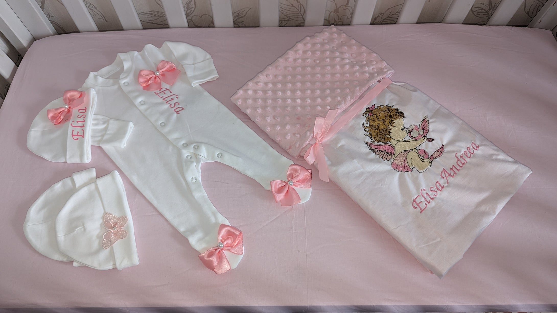 Baby blanket and baby grow personalised by embroidery