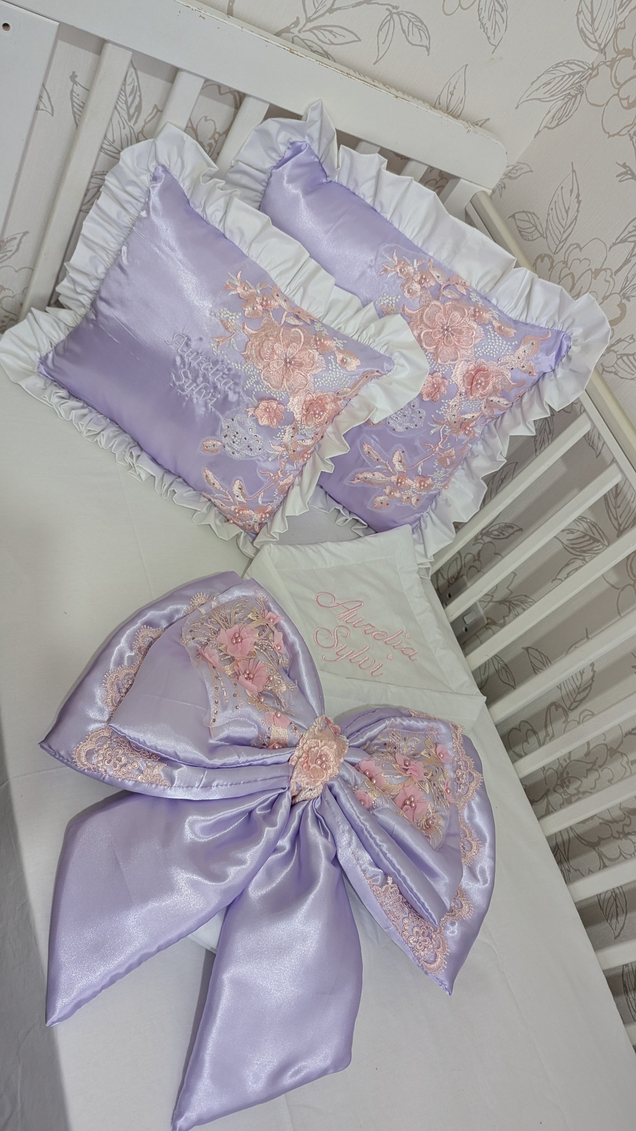 Baby blanket bow and pillow 
Made is satin